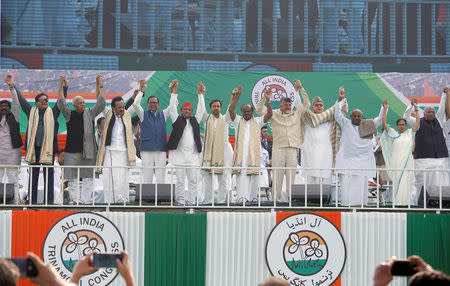 Leaders of India's main opposition parties join their hands together during "United India" rally ahead of the general election, in Kolkata, India, January 19, 2019. REUTERS/Rupak De Chowdhuri