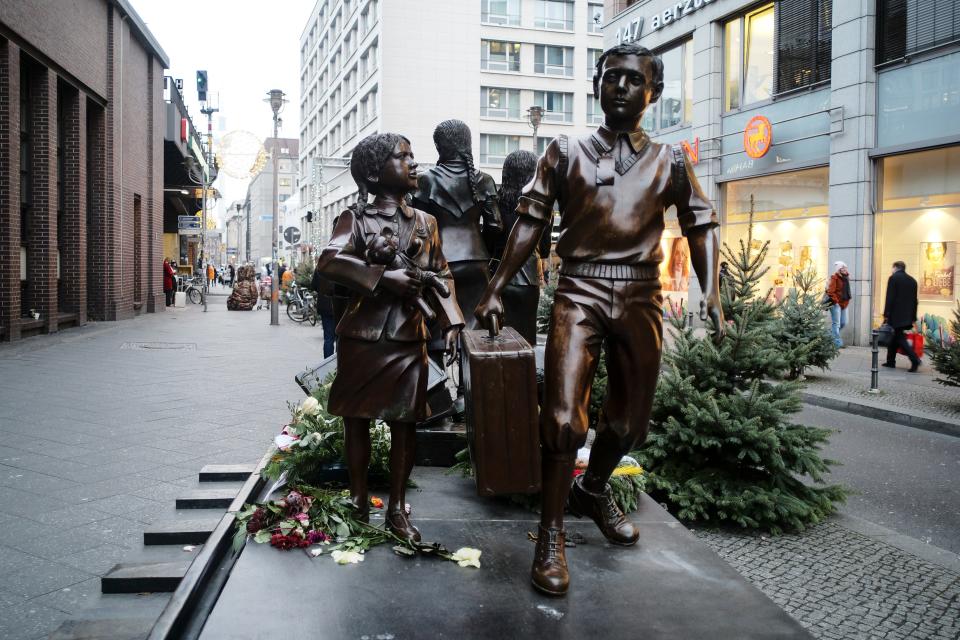 A memorial statue of the 'Kindertransport' (children transport) near Friedrichstrasse train station in central in Berlin, Germany, Dec. 17, 2018.