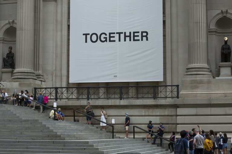 Visitors line up on the steps of the Metropolitan Museum on August 29, 2020