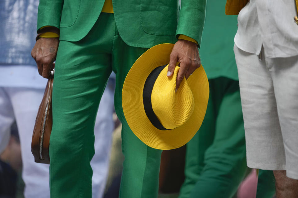 A model wears a creation as part of the Billionaire men's Spring Summer 2023 collection presented in Milan, Italy, Friday, June 17, 2022. (AP Photo/Luca Bruno)