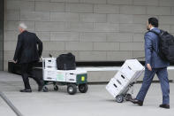 Documents to support Dallas Cowboys owner Jerry Jones' testimony are wheeled into federal court Tuesday, June 18, 2024, in Los Angeles. Jones is testifying in a class-action lawsuit filed by "Sunday Ticket" subscribers claiming the NFL broke antitrust laws. (AP Photo/Damian Dovarganes)