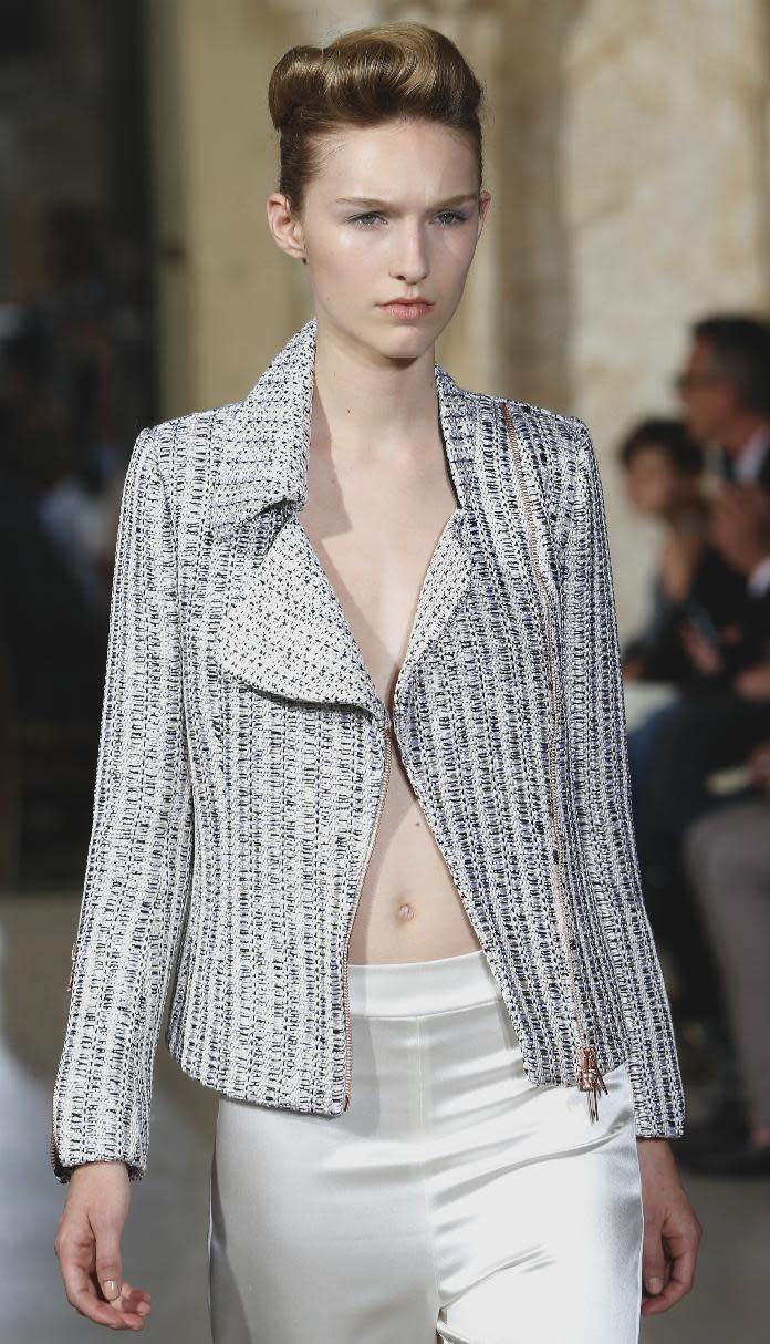 A model wears a creation by fashion designer Bouchra Jarrar during her Women's Fall Winter 2013-2014 haute couture fashion collection presented at Antoine Bourdelle Museum, in Paris Tuesday, July 2, 2013 in Paris. (AP Photo/Jacques Brinon)