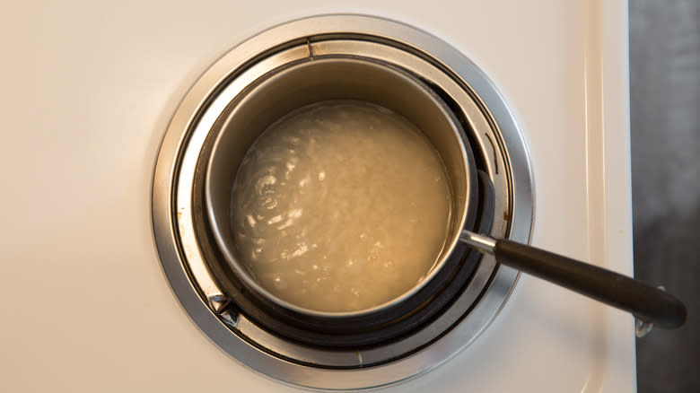 rice simmering in small pot 