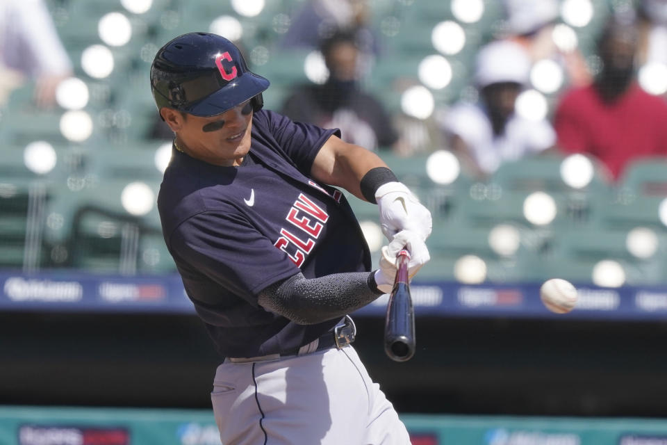 Cleveland Indians' Yu Chang connects for a double during the second inning of a baseball game against the Detroit Tigers, Sunday, April 4, 2021, in Detroit. (AP Photo/Carlos Osorio)