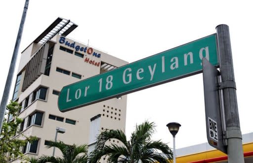 One of the red-light district streets leading to a budget hotel in Singapore is pictured in December 2010. Despite its prudish reputation -- the government still bans magazines like Playboy and Penthouse -- Singapore allows prostitution to thrive in strictly designated areas, and Geylang is the largest and most famous