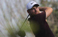 England's Jordan Smith tees off on the 2nd hole during the first round of the DP World Tour Championship golf tournament in Dubai, United Arab Emirates, Thursday, Nov. 15, 2018. (AP Photo/Kamran Jebreili)