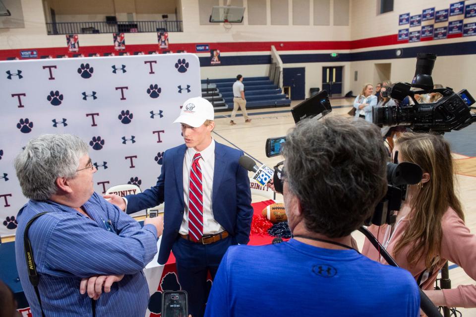 Trinity’s Webber McClinton talks with media after signing to play football with South Alabama at Trinity Presbyterian School in Montgomery, Ala., on Wednesday, Feb. 7, 2024.