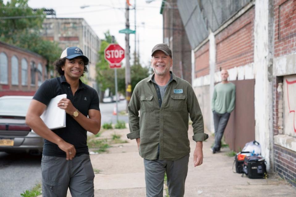 M. Night Shyamalan and Bruce Willis in 2019. ©Universal/courtesy Everett / Everett Collection