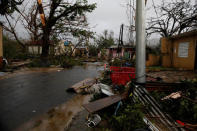 Damaged houses and debris are seen after the area was hit by Hurricane Maria in Guayama, Puerto Rico September 20, 2017. REUTERS/Carlos Garcia Rawlins