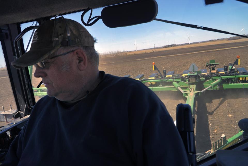 Crop farmer Bob Worth plants corn in one of the many fields on his family's 2,100 acres in Lake Benton, Minn., on Tuesday, May 2, 2023. Worth is a third-generation farmer who battled depression in the early '80s and now advocates for further help and deeper conversations around mental health and suicide prevention. (AP Photo/Jessie Wardarski)