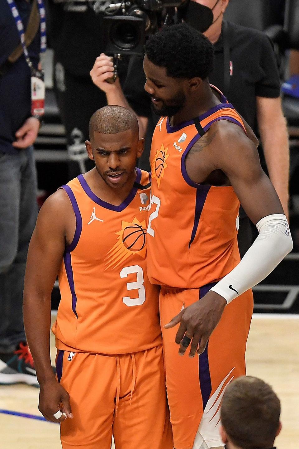 Deandre Ayton (right) called Chris Paul’s presence “the best thing that happened in my career.”