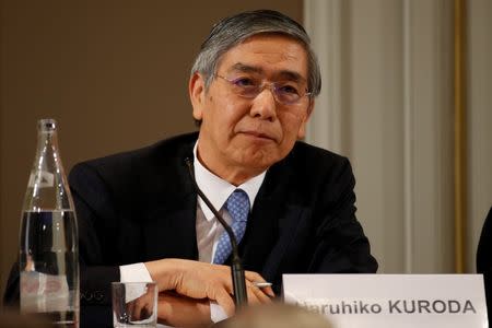 Bank of Japan Governor Haruhiko Kuroda attends a conference of central bankers hosted by the Bank of France in Paris November 7, 2014. REUTERS/Charles Platiau