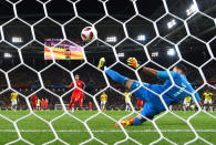 <p>Harry Kane of England scores the opening goal from a penalty past David Ospina of Colombia during the 2018 FIFA World Cup Russia Round of 16 match between Colombia and England at Spartak Stadium on July 3, 2018 in Moscow, Russia. (Photo by Mike Hewitt – FIFA/FIFA via Getty Images) </p>