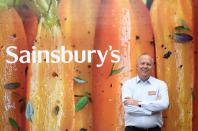 Chief Executive Officer of Sainsbury's Simon Roberts poses inside a Sainsbury’s supermarket in Richmond, west London