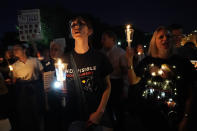 <p>Activists participate in a vigil in front of the White House on July 18, 2018, in Washington, D.C. (Photo: Alex Wong/Getty Images) </p>