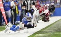 <p>Atlanta Falcons running back Tevin Coleman (26) is taken out of bounds by Detroit Lions strong safety Miles Killebrew (35) during the first half of an NFL football game, Sunday, Sept. 24, 2017, in Detroit. (AP Photo/Rick Osentoski) </p>
