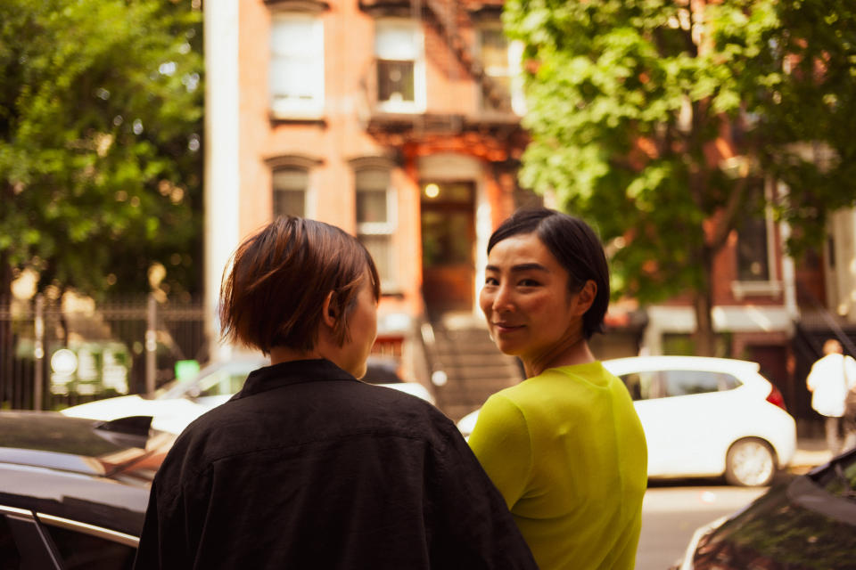 Celine Song and greta Lee in front of Nora's apartment in Manhattan's East Village on June 20, 2023.