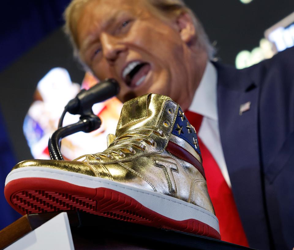 Former President Donald Trump introduces his signature shoes at “Sneaker Con” in Philadelphia on Feb. 17, 2024. The sneakers are currently being marketed as “Never Surrender High-Tops