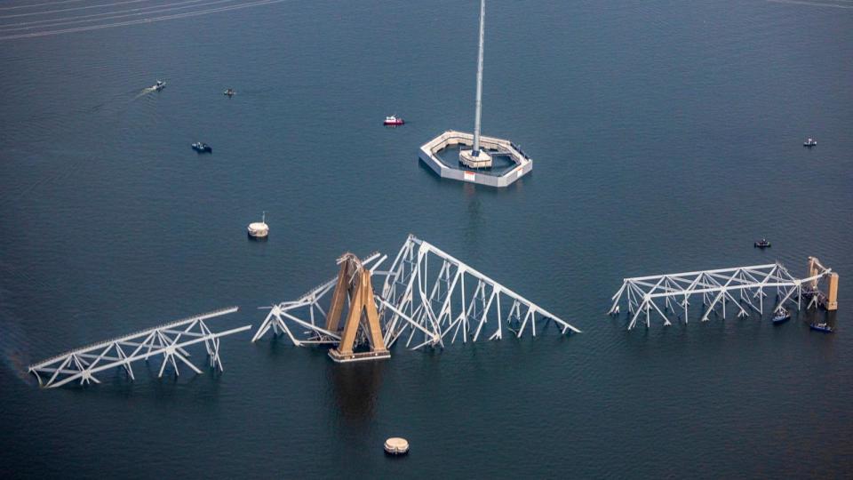 PHOTO: In an aerial view, cargo ship Dali is seen after running into and collapsing the Francis Scott Key Bridge on March 26, 2024 in Baltimore. (Tasos Katopodis/Getty Images)