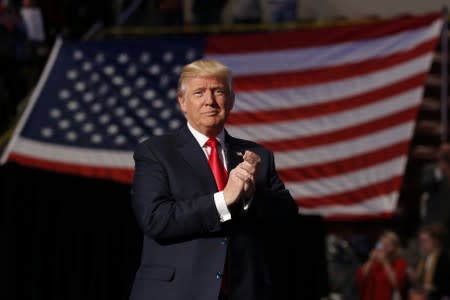 U.S. President-elect Donald Trump arrives to speak during a USA Thank You Tour event at Giant Center in Hershey, Pennsylvania