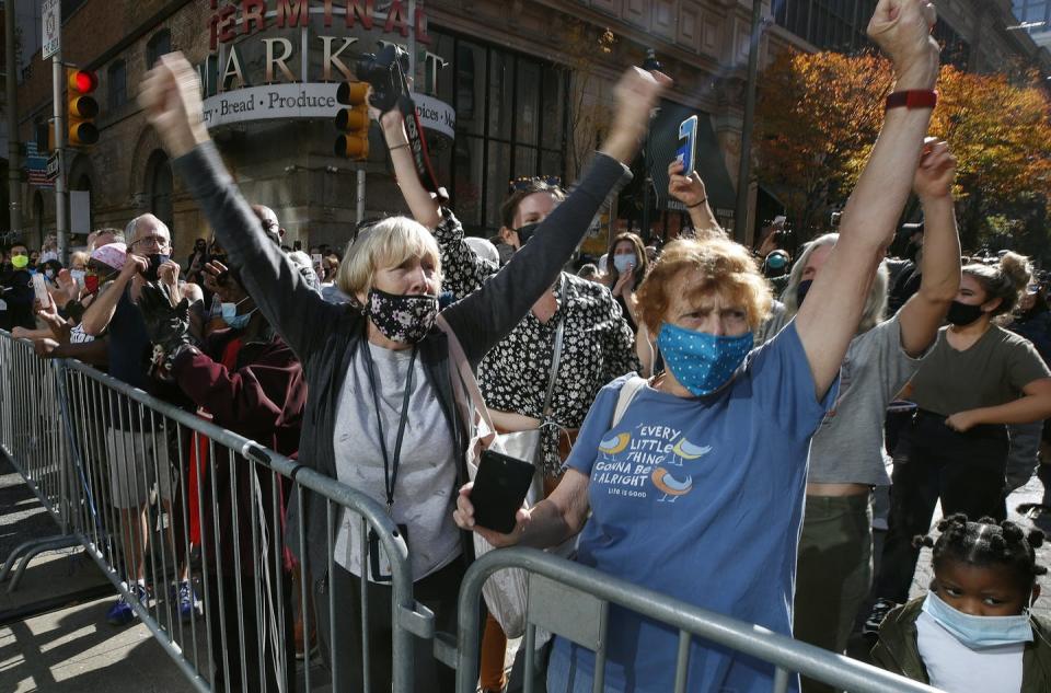 People celebrate the election being called for Biden outside the Pennsylvania Convention Center in Philadelphia on Nov. 7.