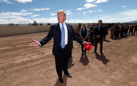 U.S. President Donald Trump visits the US-Mexico border in Calexico California, U.S., April 5, 2019. REUTERS/Kevin Lamarque/Files