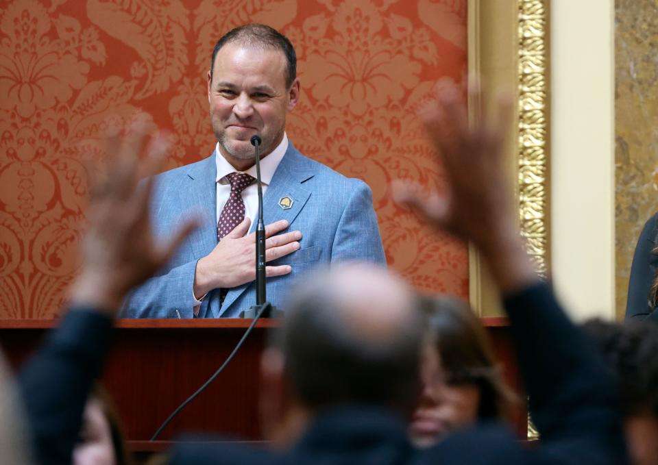 House Speaker Mike Schultz, R-Hooper, smiles as he watches Dr. Michael Huff direct the Snow College Cadence Chamber Choir on the first day of the general legislative session in the House chamber at the Capitol in Salt Lake City on Tuesday, Jan. 16, 2024. | Kristin Murphy, Deseret News
