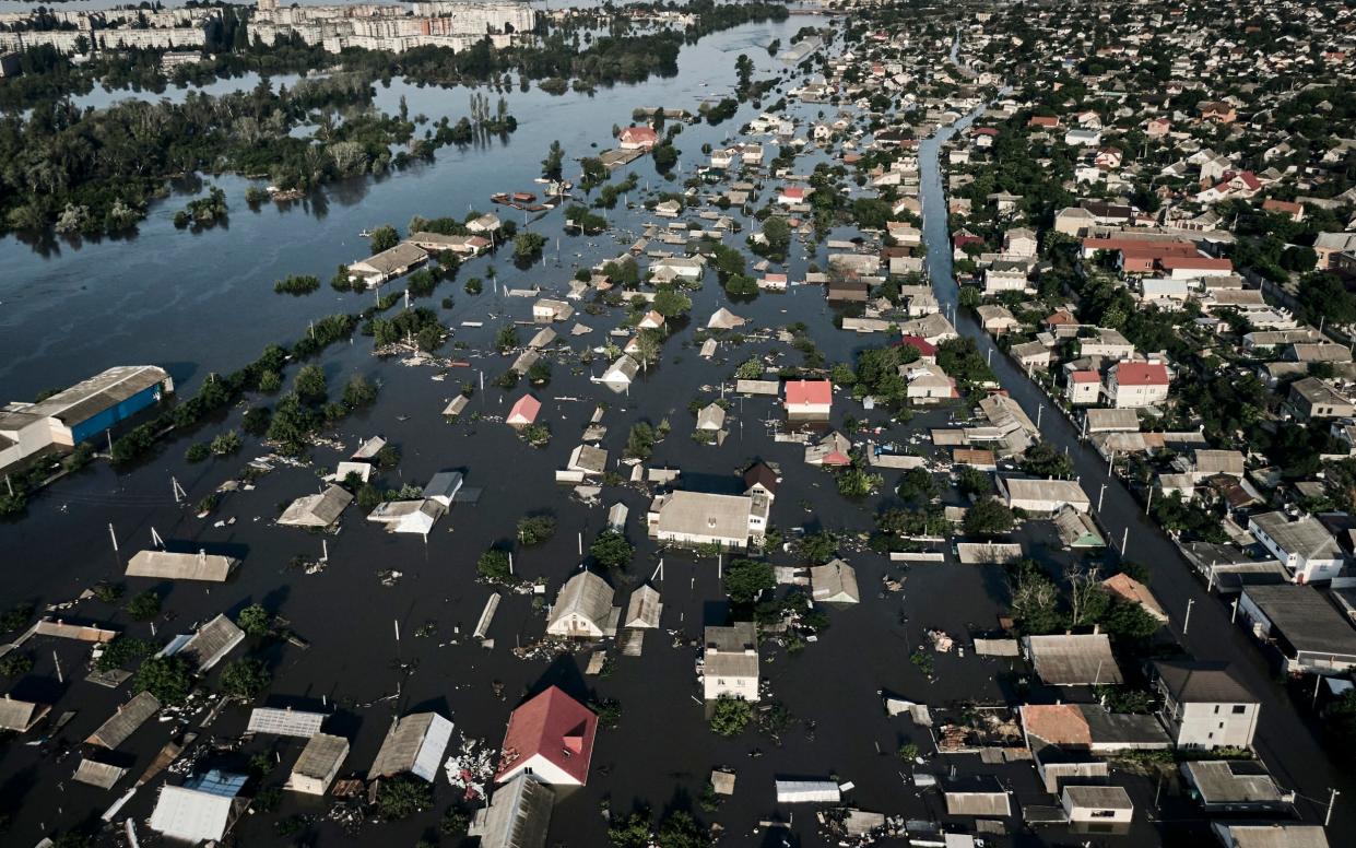 Flooded streets in Kherson after the Kakhovka dam was blown up - Libkos/AP