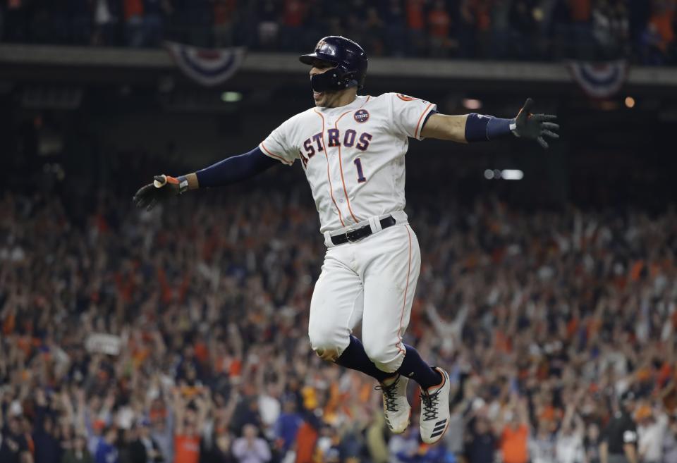 Carlos Correa knows how to celebrate awesome baseball things. (AP Photo)
