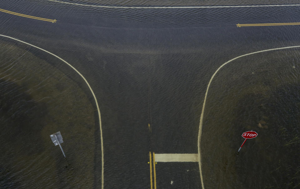 Some roads remain flooded in Surfside Beach, Texas, after Tropical Storm Beta made landfall overnight, on Tuesday, Sept. 22, 2020. (Godofredo A. Vásquez/Houston Chronicle via AP)