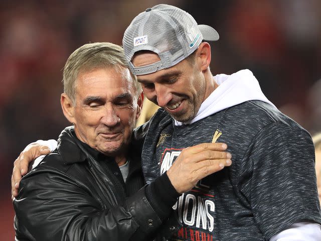 <p>Sean M. Haffey/Getty</p> Kyle Shanahan of the San Francisco 49ers celebrates with his father, Mike Shanahan after winning the NFC Championship game on January 19, 2020 in Santa Clara, California.