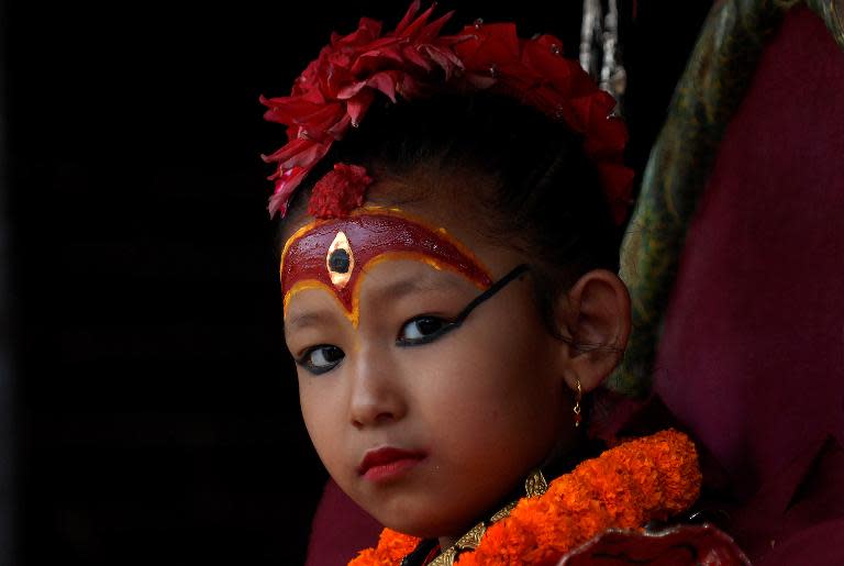 The Kumari, considered a living goddess, attends festivities on the last day of the 2014 Rato Machindranath chariot festival on the outskirts of Kathmandu