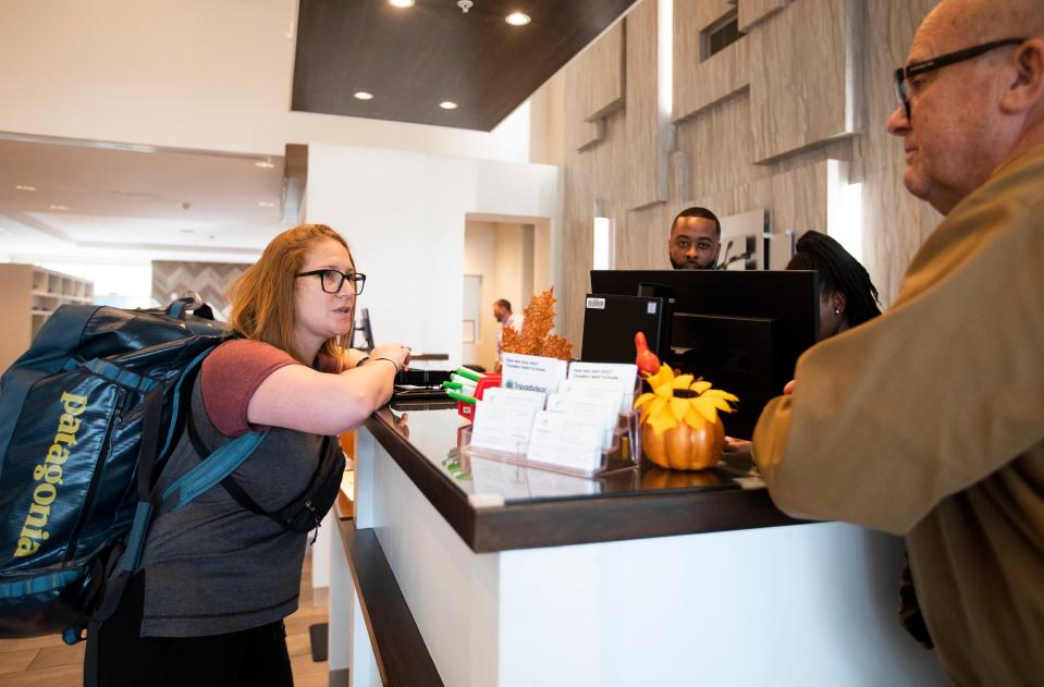 People check in at the Holiday Inn Tallahassee East Capital on Tuesday, Sept. 27, 2022 in anticipation of Hurricane Ian.