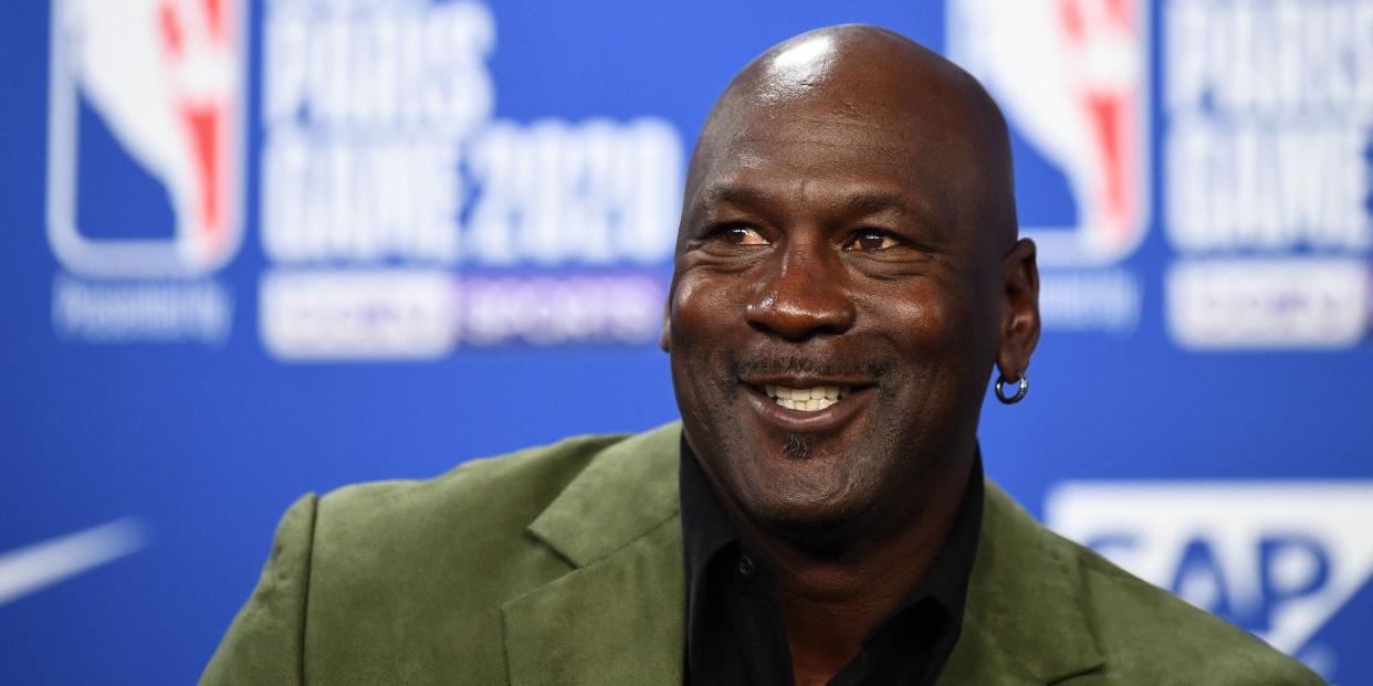 Michael Jordan smiles at a press conference in 2020.