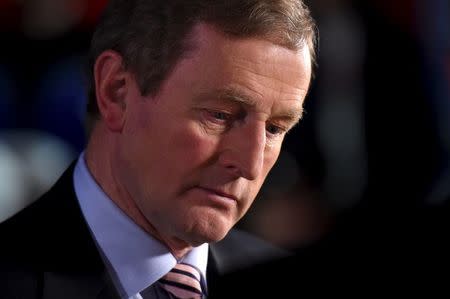 Irish Prime Minister Enda Kenny pauses before speaking to the media at the general election count centre in Castlebar, Ireland February 27, 2016. REUTERS/Clodagh Kilcoyne