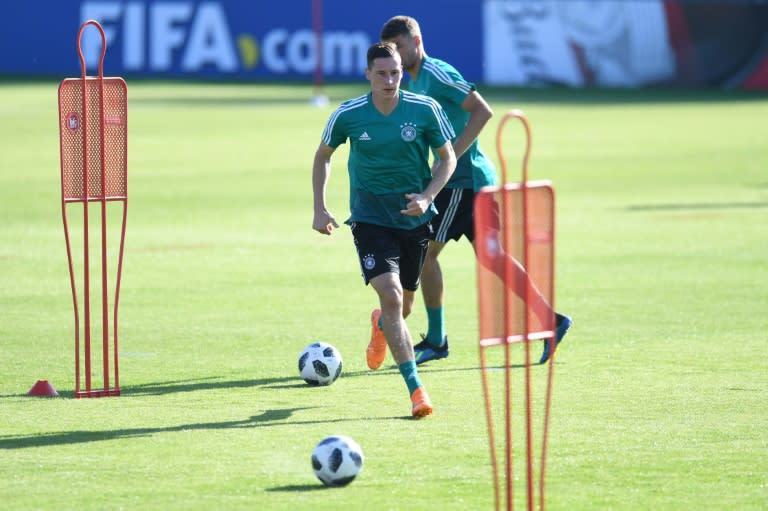 Germany, and midfielder Julian Draxler, are training behind a high wall in Vatutinki outside Moscow