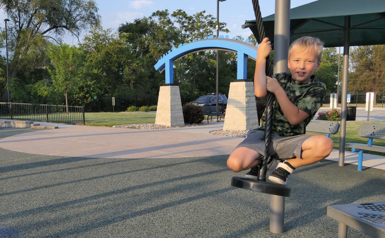 Sam Collier 8, of Salina enjoys Olivia's Playground on Aug. 15 in Salina.