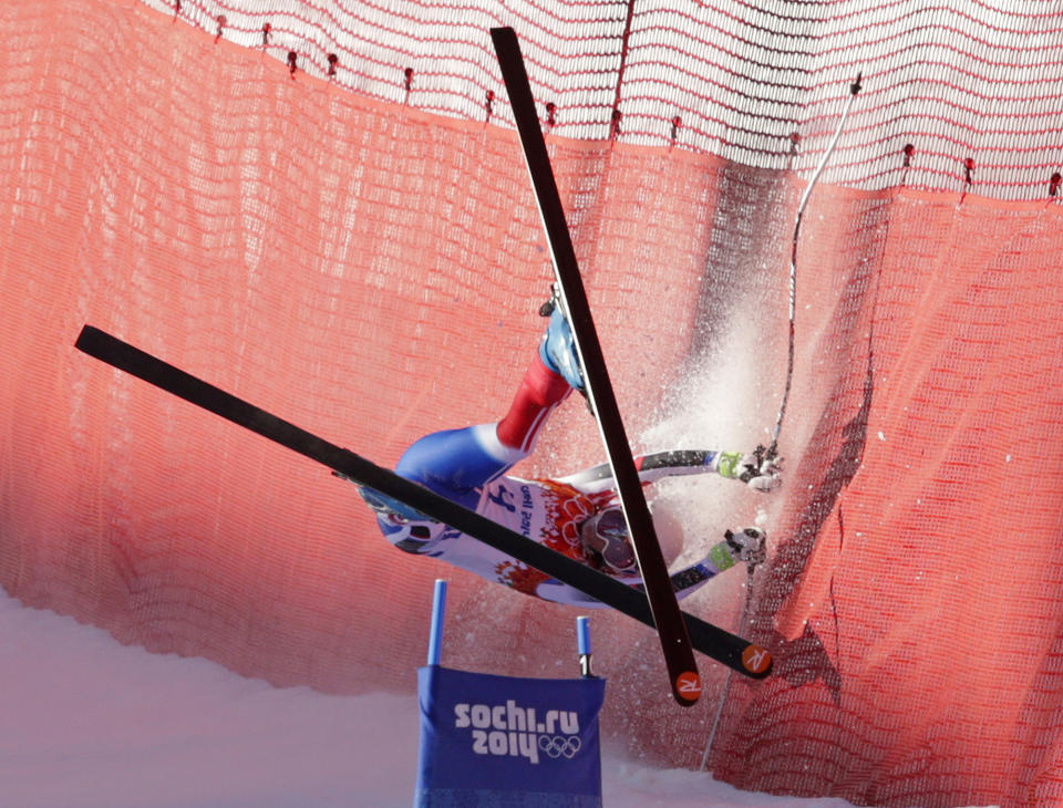 France's Marie Marchand-Arvier crashes into safety netting during the women's downhill at the Sochi 2014 Winter Olympics, Wednesday, Feb. 12, 2014, in Krasnaya Polyana, Russia. (AP Photo/Charles Krupa)