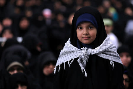 A girl from Qom is seen during a meeting with Iran's Supreme Leader Ayatollah Ali Khamenei, in Teheran, Iran, January 9, 2019. Official Khamenei website/Handout via REUTERS