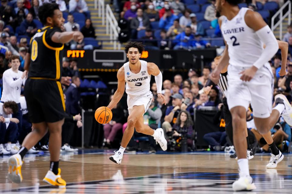 Colby Jones (3) had a 10-point, 14-rebound double-double in Xavier's second-round victory over Pittsburgh in the NCAA Tournament on Sunday, March 19, 2023 at Greensboro Coliseum in Greensboro, N.C. The win gave Xavier its first Sweet 16 appearance since 2017.