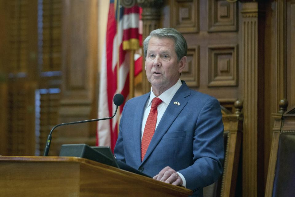 FILE -- Georgia Gov. Brian Kemp addresses the state House of Representatives at the Capitol in Atlanta on Thursday, March 28, 2024. Kemp on Tuesday, May 7, 2024, vetoed a bill that would have suspended tax breaks for new and expanding data centers. (Arvin Temkar/Atlanta Journal-Constitution via AP, file)