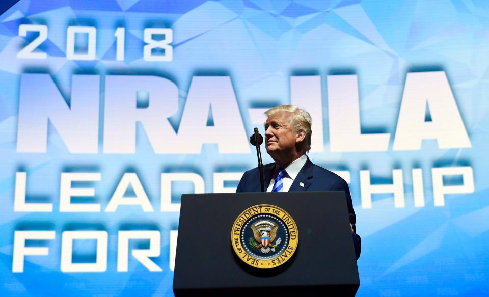 Then-President Donald Trump speaks at the National Rifle Association's annual convention in Dallas, May 4, 2018.