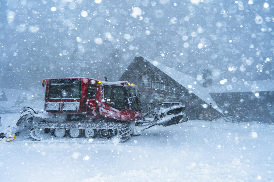 In this photo provided by Mammoth Mountain Ski Area, snow falls in Mammoth Lakes, Calif., Saturday, May 4, 2024. A weekend spring storm that drenched the San Francisco Bay area and closed Northern California mountain highways also set a single-day snowfall record for the season on Sunday in the Sierra Nevada. (Peter Morning/Mammoth Mountain Ski Area via AP)