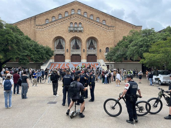 Protesters start gathering on campus in support of Gaza. University Police and Department of Public Safety Troopers begin walling off protesters’ intended gathering area, not letting others in. April 24, 2024. (KXAN Photo/Ryan Chandler)