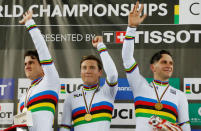 Cycling - UCI Track World Championships - Men's Team Sprint, Final - Hong Kong, China – 12/4/17 - New Zealand's Sam Webster, Ethan Mitchell and Edward Dawkins celebrate with gold medals. REUTERS/Bobby Yip