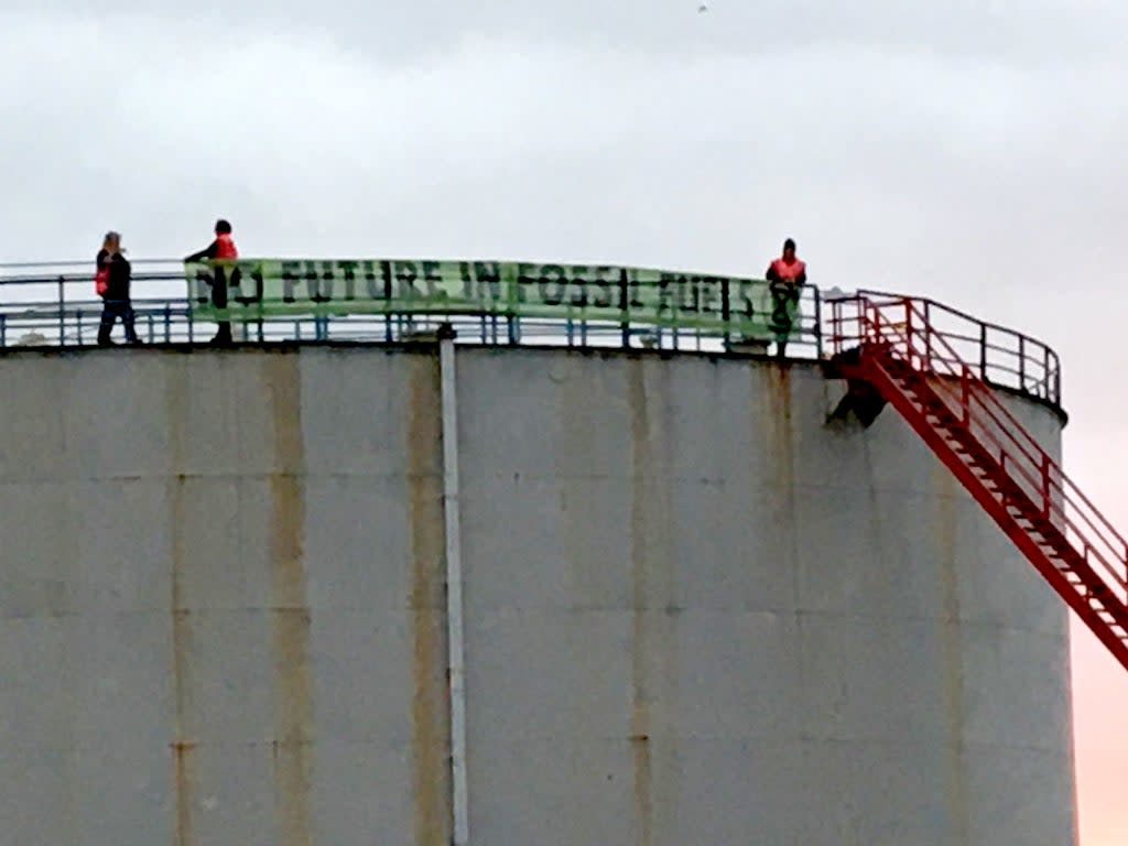 XR protestors climbed a silo at the Fawley oil refinery in Hampshire on Thursday (Extinction Rebellion)