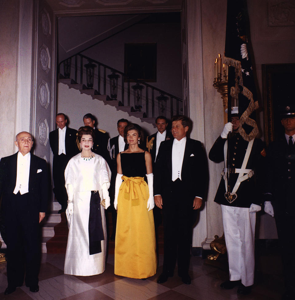 The Kennedys before a dinner in honor of the president of Peru at the White House.