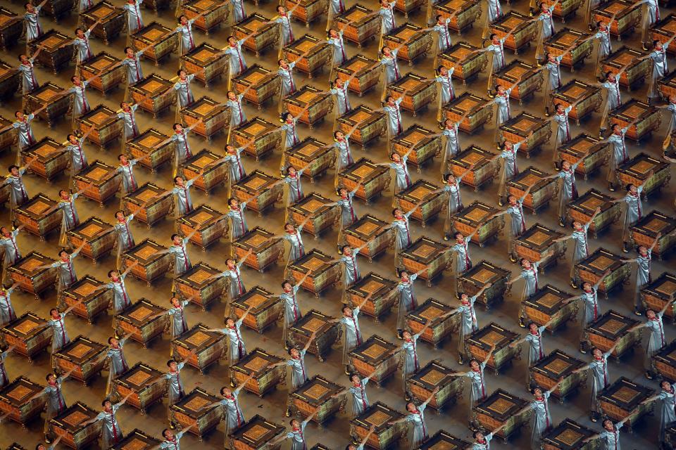 Drummers perform during the opening ceremony for the 2008 Summer Olympics at the National Stadium in Beijing, China.