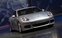 The new Porsche Panamera S e-hybrid car is presented at the Volkswagen group night at the Frankfurt motor show September 9, 2013. The world's biggest auto show is open to the public September 14 -22. REUTERS/Ralph Orlowski (GERMANY - Tags: BUSINESS TRANSPORT)