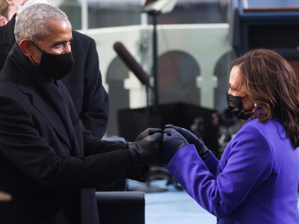 Barack Obama, America’s first Black president, fist-bumps Kamala Harris, the first Black vice presidentEPA